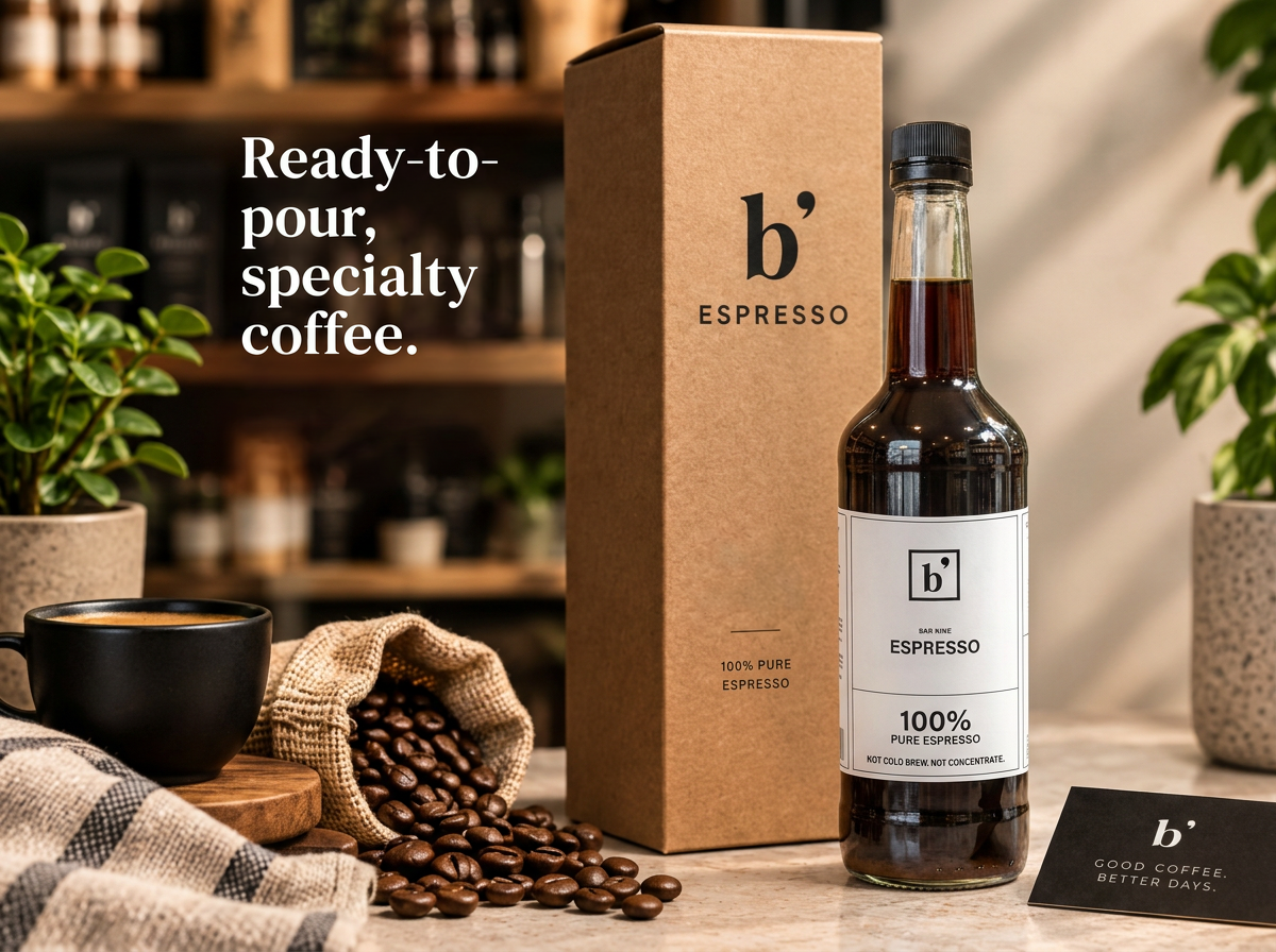 Bar Nine Pure Espresso bottle beside its kraft gift box with coffee beans and a black cup